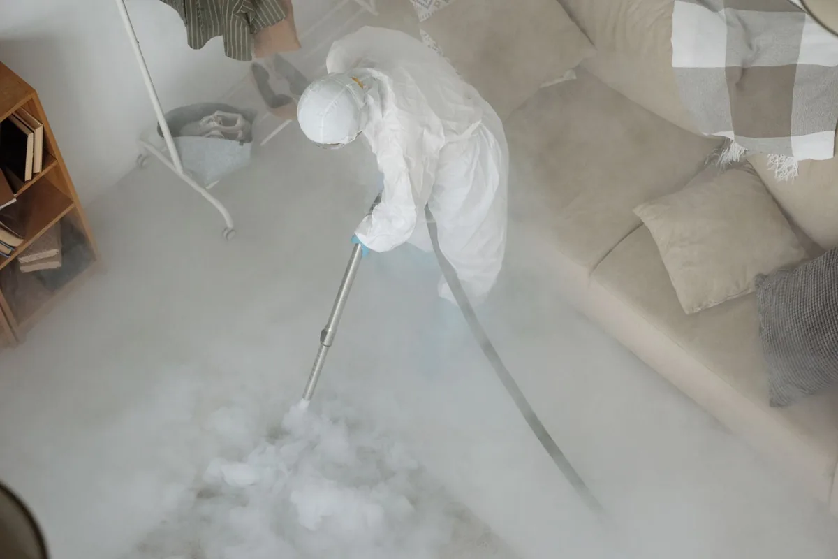Biohazard cleanup technician in protective equipment, Hartsville/Trousdale County, TN